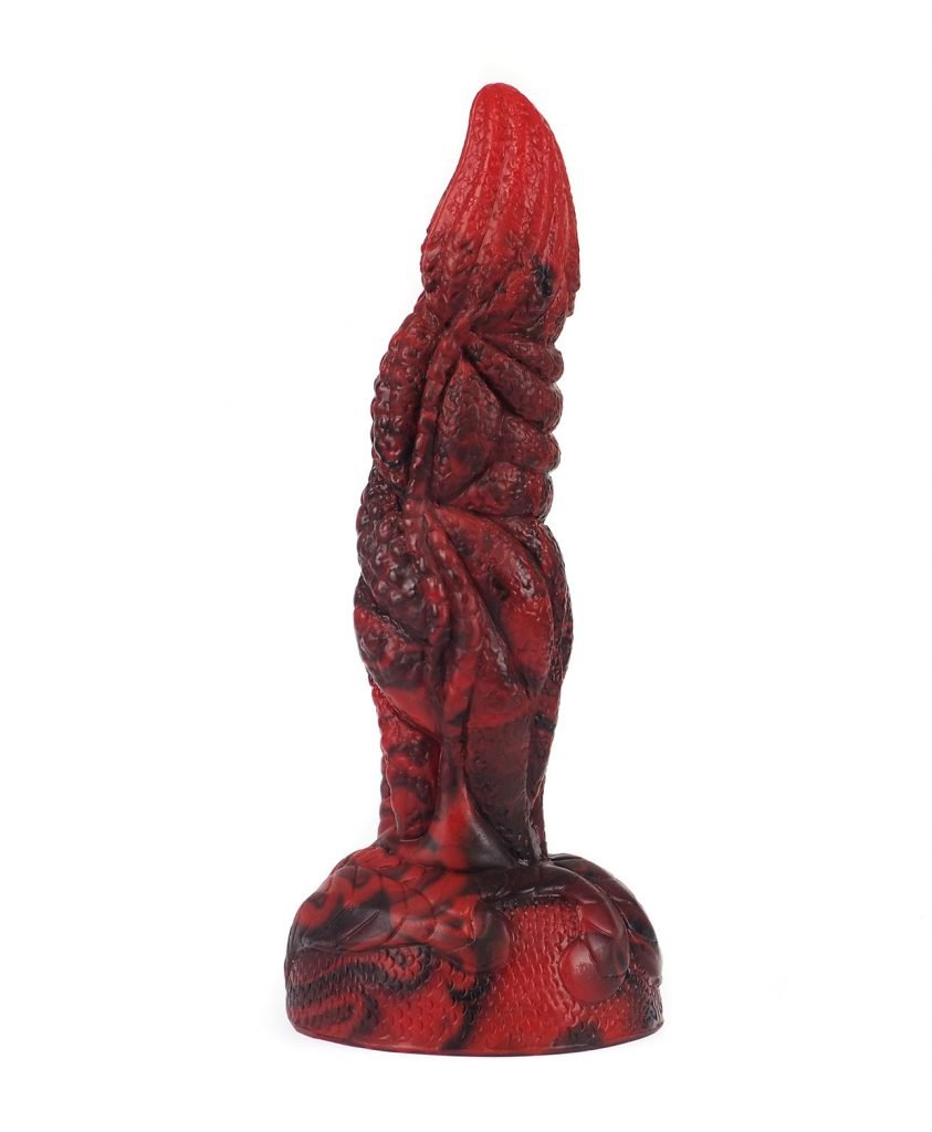 Red and black marbled Drodong Dragon Dildo with scale texture and suction cup base, front view