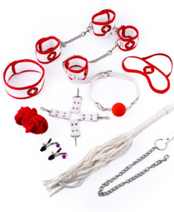 Full Nurse Bondage Kit contents displayed together with white leather items and red accents