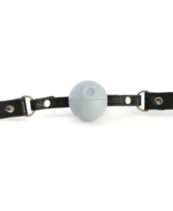 Side view of the Space Station Ball Gag showing the textured grey sphere and adjustable black strap